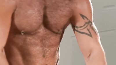 Adam Rogue receives electro stimulation while bound in 3way