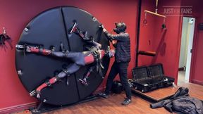 Pup Twink Dressed as Spider-man Strapped to the Bondage Wheel and Milked