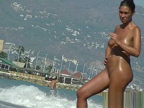 Having fun at our local nude beach flashing my tits and hair