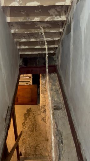 Pising down the stairs