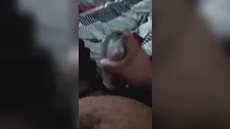 Solo guy jerks his big black cock with a fleshlight sleeve