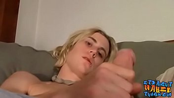Striking long haired blond works on his rock solid cock