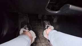 Automatic car driving in winter sneakers