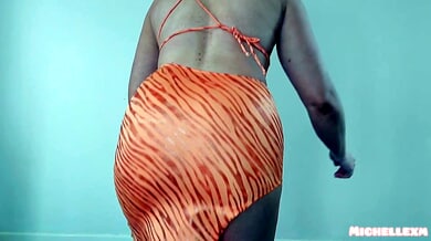 Blonde strips through her lingerie and dress collection with flashing upskirt views