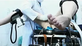 Doctor administers a hardcore gyno exam
