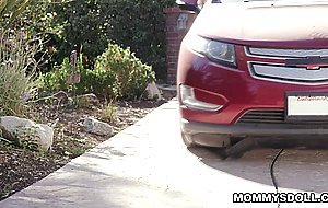 Mom and stepdaughter get caught up in the moment and share a passionate kiss