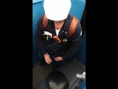 Bearded Hunk Strokes Cock Outdoors in a Porty Potty