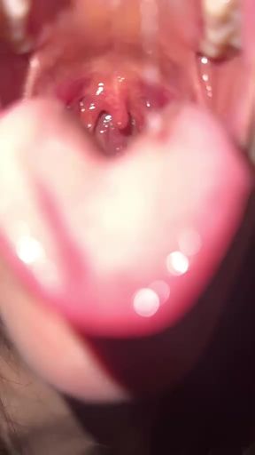 Close-up of mouth with toothpaste