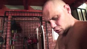 Wild leather-bound sex slave submission to Nacho Vidal's raw, aggressive domination