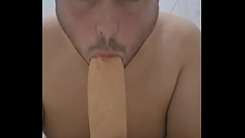 Dutch fag sucking dildo