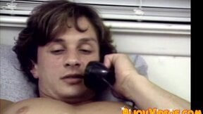 Hunks are stroking their cocks together in vintage video