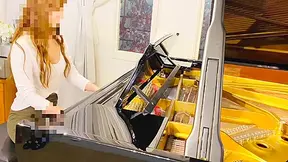 Playing The Piano And Teasing The Slave With Heels In A Rear Seated Position