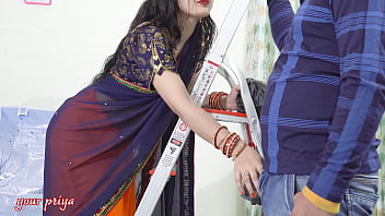 Young indian girl desi bhabhi cleaning fans on stairs, in front of devar ji