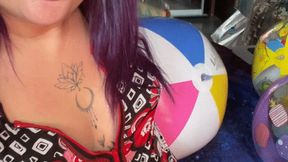 girl in room deflate beachballs