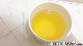 Kinky babe from Japan keeps track of how much she can pee