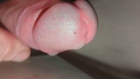 Extreme close-up edging, leaking oiled uncut foreskin wank, multiple cumshots into glass