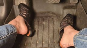 Fifi pedal pumping in slip on leather mules sandals and blue jeans