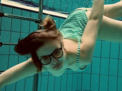 Big titted Dashka bounces body underwater