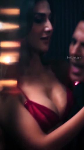 Celebrity Indian actress squeezes her boobs in a sexy scene