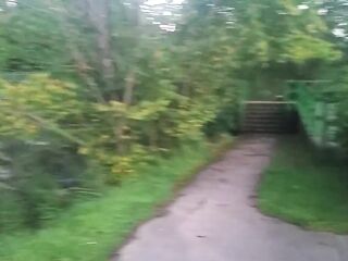 pissing into bin in the park