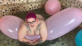 Balloons in the hot tub: riding and playing, non pop