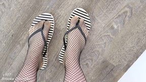 Flip flops, high heels, and fishnets