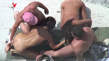Two Hot Wives Giving Head On Public Beach In Daylight