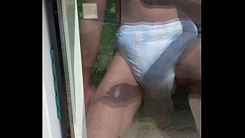 Diaperlover checks a window