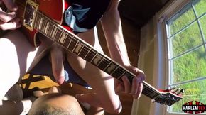 Gay blowjob while playing guitar