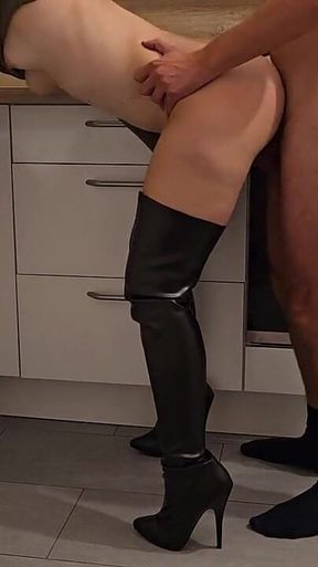 Blonde Girl Gets Fucked in Overknee Boots in the Kitchen