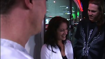 Sandy Beach is a smashing, dark haired cougar who likes to suck dick while riding another one