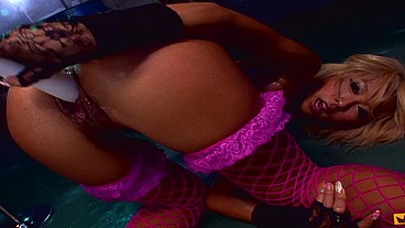 Naughty Japanese stripper pleases her hairy pussy with a big toy