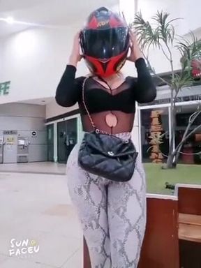 Girl outdoor anal square with her motorcycle helmet