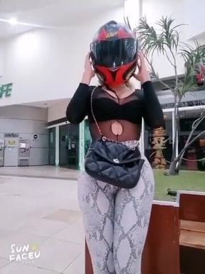 Girl outdoor anal square with her motorcycle helmet