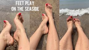 Feet play on the seaside