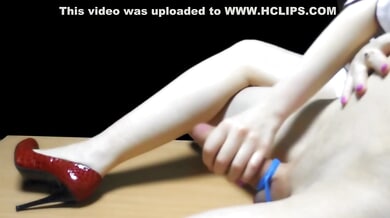 Redhead nurse in stiletto heels teases with her feet and makes him cum twice