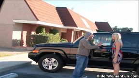 Soccer milf satisfies her cum hungry pussy and mouth