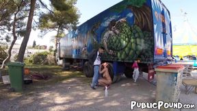 Cute redhead babe gets fucked next to a big truck outside
