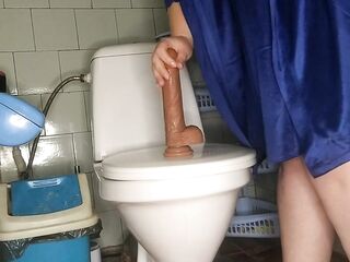 Curvy mother I'd like to fuck pissing and screwing her sex tool in the water closet