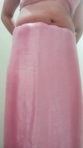 Indian Gay Crossdresser Gaurisissy Pressing and Playing with Her Big Boobs Looking in Pink Saree Looking Like a Housewife