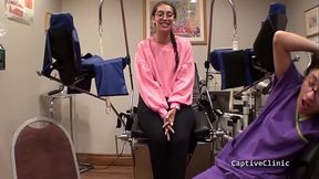 Black-haired nurse Kitty Catherine gets interrupted while using a magic wand on her big tits