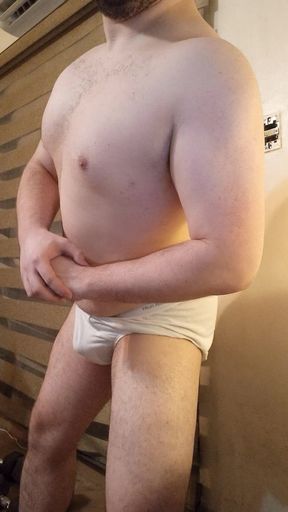 Muscular Stud Plays with His Bulge and Nipples