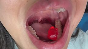 Swallowing gummy bear extreme close up
