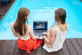 Girlfriends enjoy swimming naked together