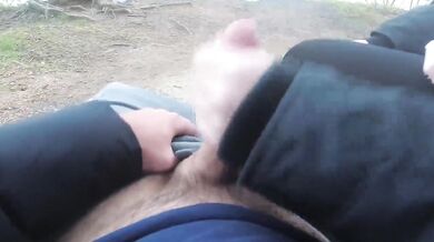Risky handjob on a park bench with cumshot and spitting