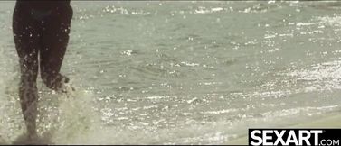 Watch these gorgeous beach babes enjoy passionate lesbian sex