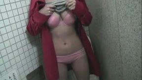 This slut loves to expose her private parts in the public restrooms