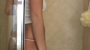 Teen temptress flaunts her fresh physique &mdash;  dripping wet and utterly unrepentant in that clingy tee