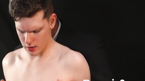 Ethan Tate fulfills his master's horny desire in the darkroom