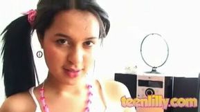 Teen Lilly has these great tits and shows off her nipples